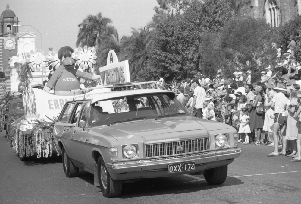 Reid's Early Bird mascot riding the Reid's Department Store Float in the Ipswich Colour Festival Parade, Ipswich, September 1980