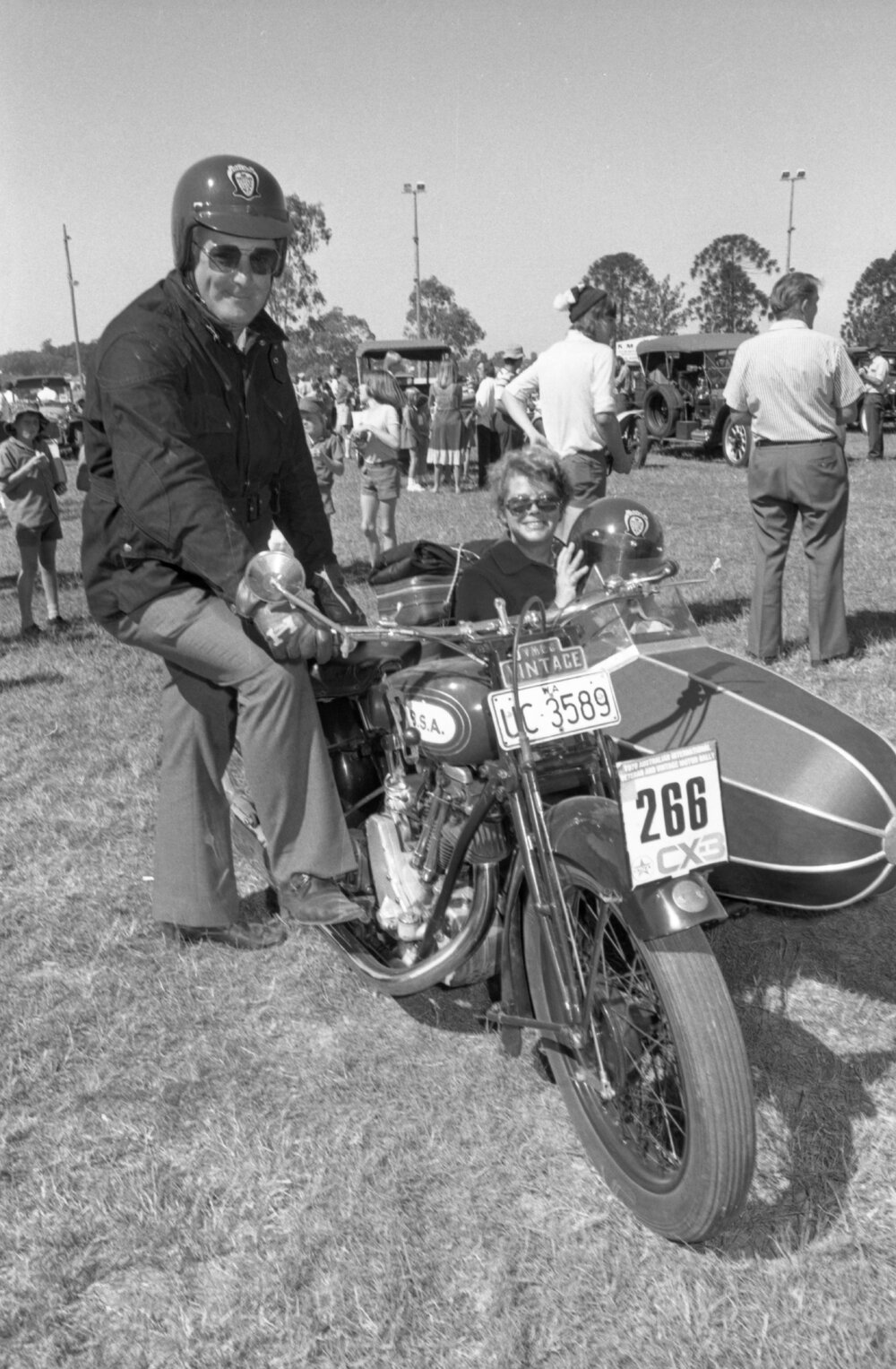 Man and woman on vintage BSA motorcycle with sidecar at the 1978 Australian International Veteran and Vintage Motor Rally at the Ipswich Showgrounds, Ipswich, April 1978