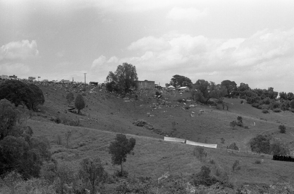 Racegoers on a hillside at the 1979 Queensland Times Off-Road Spectacular, Minden, Somerset, November 1979