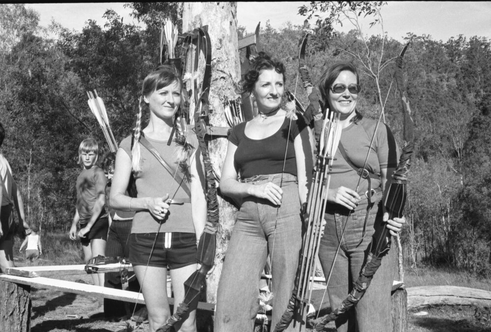 Wendy Godfrey and two unidentified women with bows and arrows for bowhunting, Ipswich, April, 1978