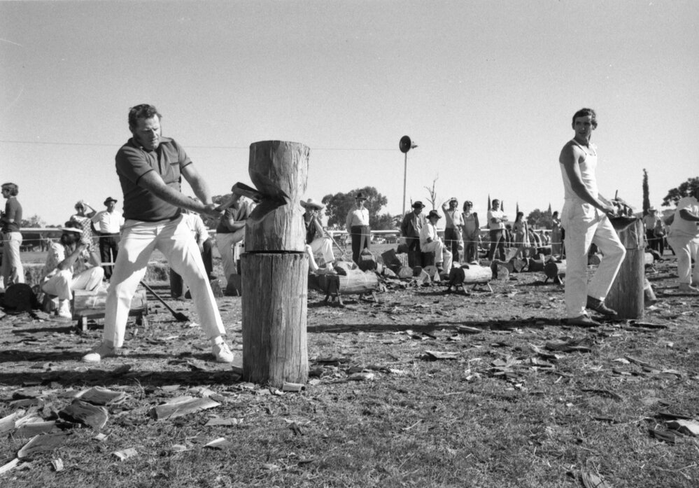 Men participating in a wood chopping competition at the Marburg Show, Marburg, Ipswich, April 1978