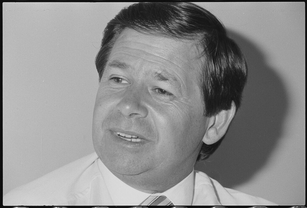 Unidentified man being photographed whilst interviewed, Ipswich, January 1986
