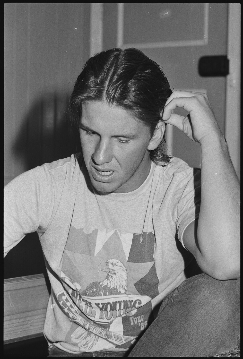 Unidentified man wearing a Neil Young tour shirt from 1985, Ipswich, January 1986