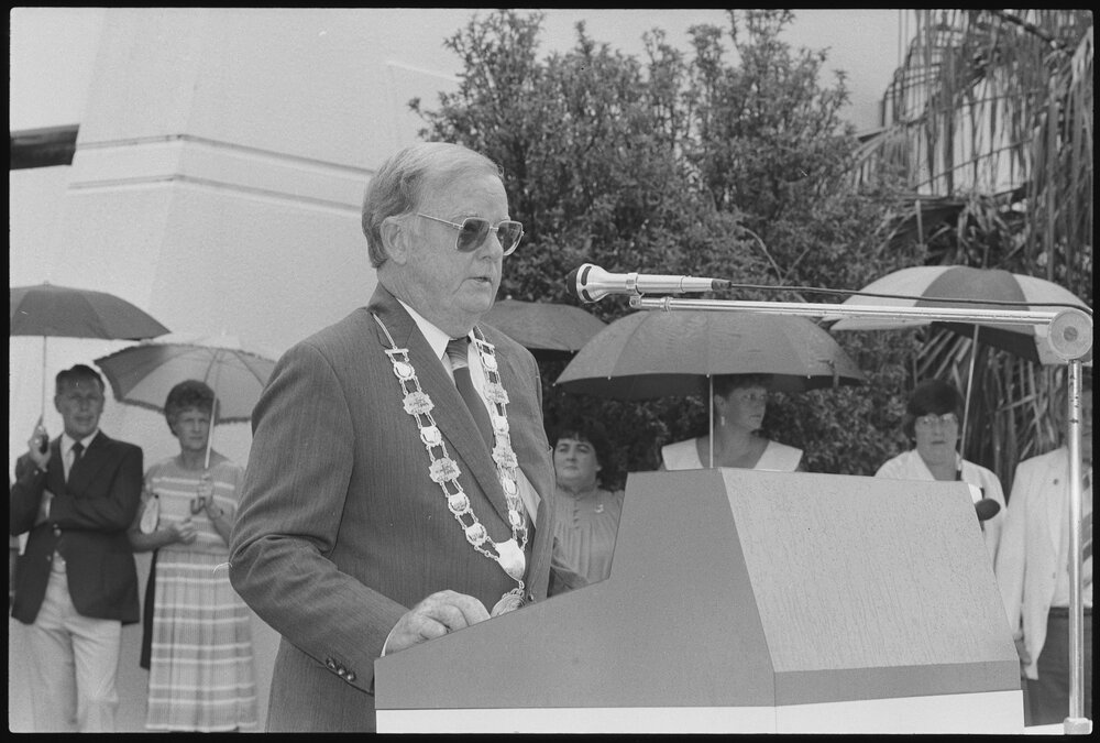 Ipswich Mayor Des Freeman addressing the Crew of H.M.A.S. Ipswich, during a 'Freedom of Entry to the City' event, Nicholas Street, Ipswich, January 1986