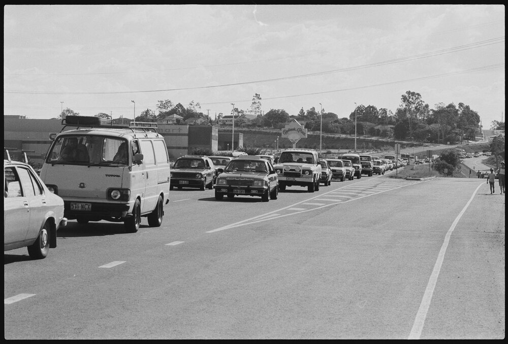 Traffic jam on way into Brisbane outside Redbank Plaza, following a fire in a ute, Ipswich, 1986 