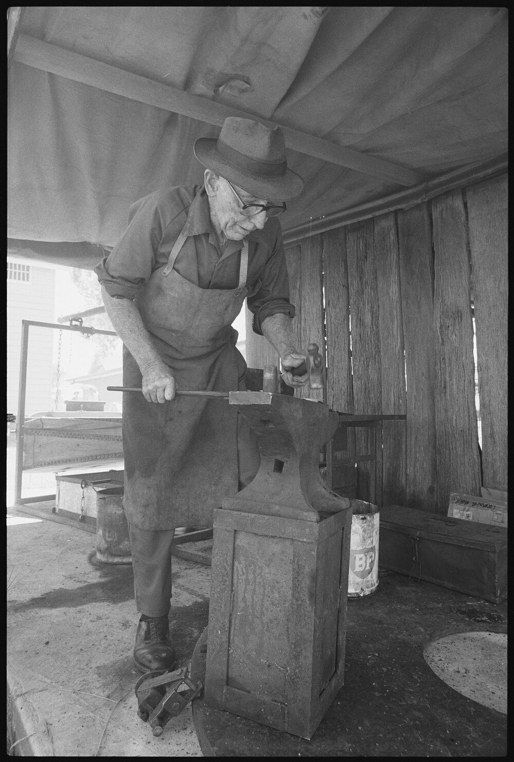 Unidentified man using an anvil, Ipswich, January 1986