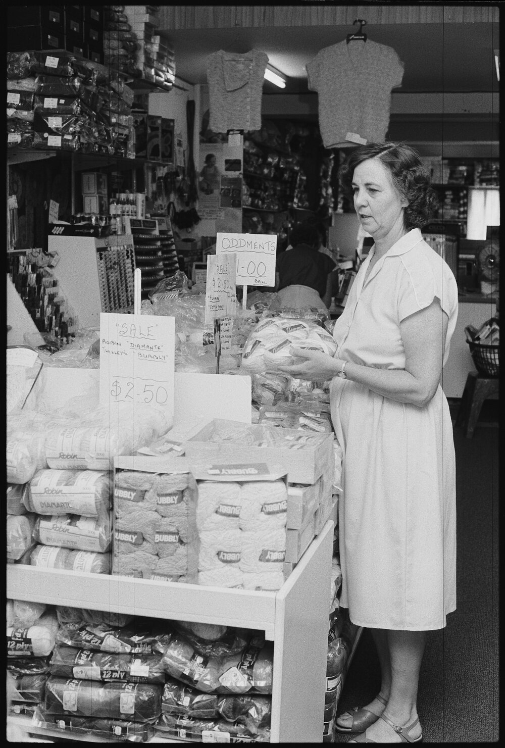 Unidentified woman in a shop thought to be The Wool Shop, Ipswich, January 1986
