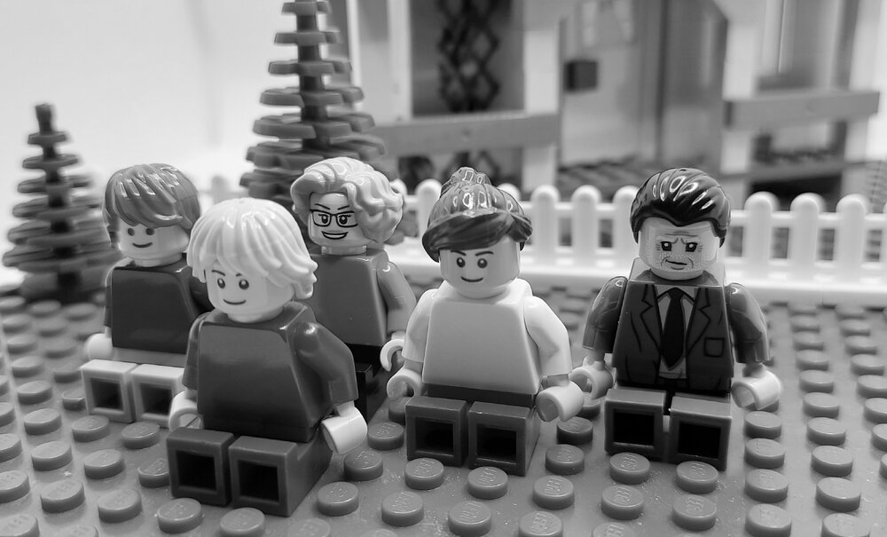 Brickswich version of a family group, outside a home in Carberry Street, Bundamba, from the 1940s