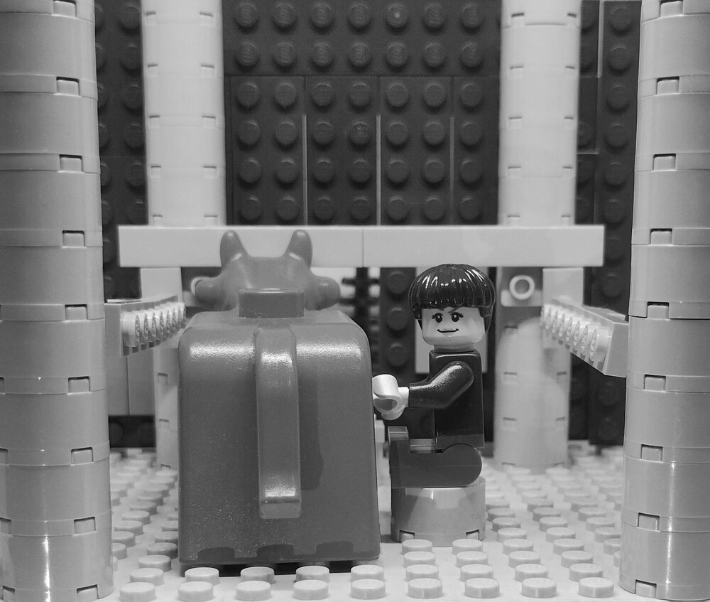 Brickswich version of Unidentified woman milking a cow on a farm near Rosewood, Ipswich, 1946