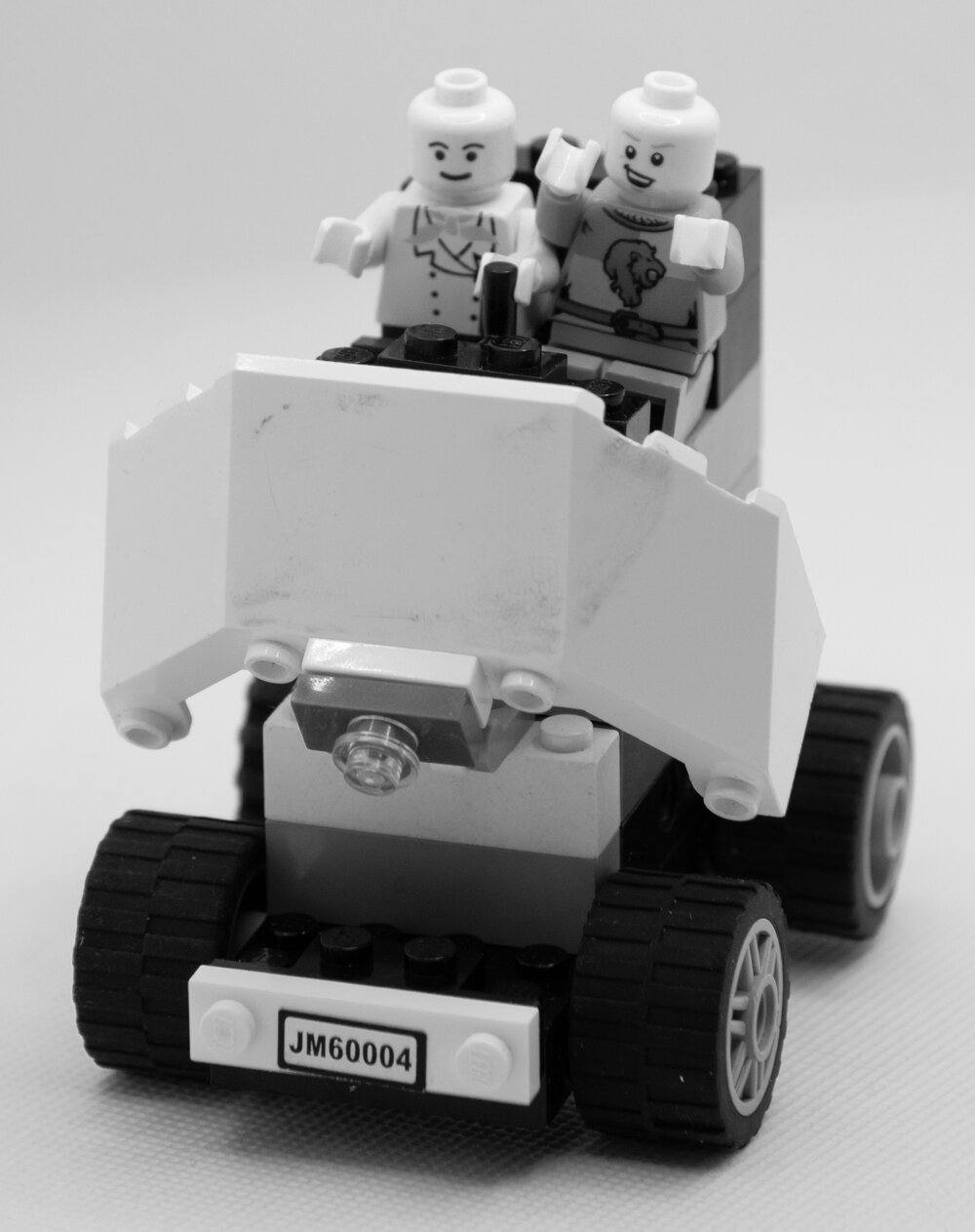 Brickswich version of two men in a Toledo Steam Carriage, from April 1978