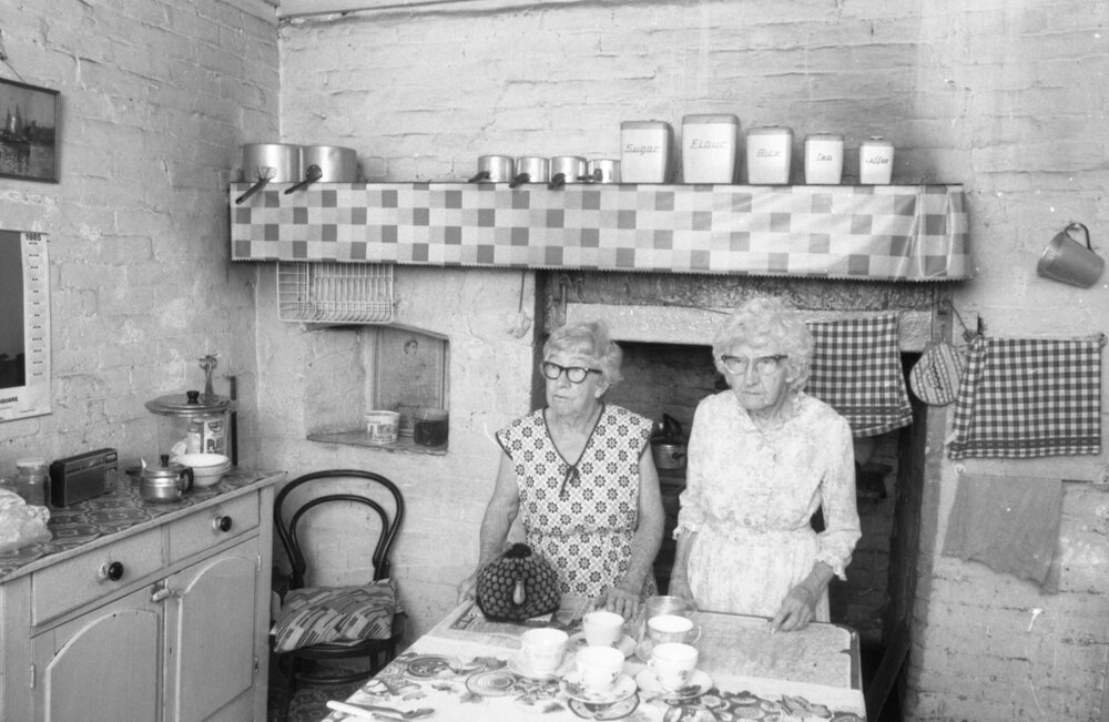 Two unidentified ladies in what is thought to be the kitchen of Notnel, 6 Burnett Street, West Ipswich, February 1985