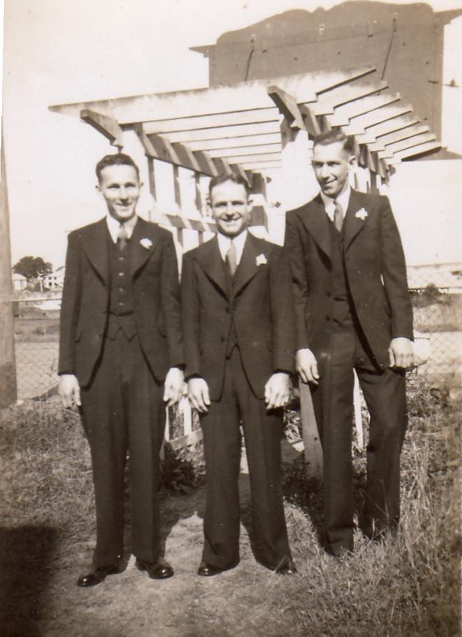 Jim Rush (middle) with groomsmen on his wedding day, Booval, September 1947