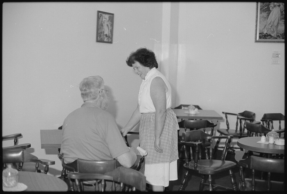 Unidentified patron and waitstaff at Eastern Wind Chinese restaurant, Ipswich, August 1985