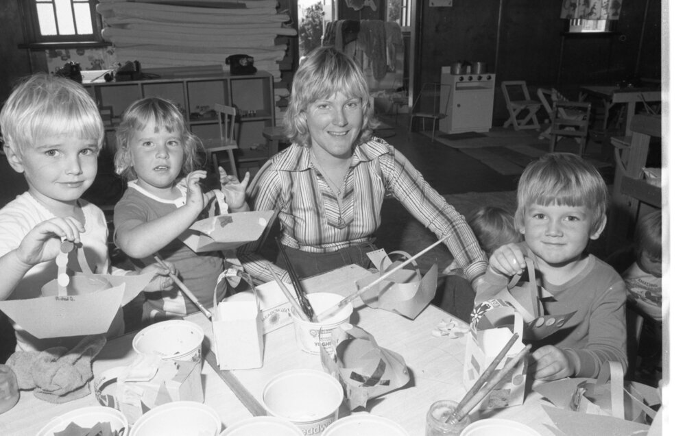 Teacher Dianne Moss (nee Adams) with students at Trinity Kindergarten, North Booval, August 1980