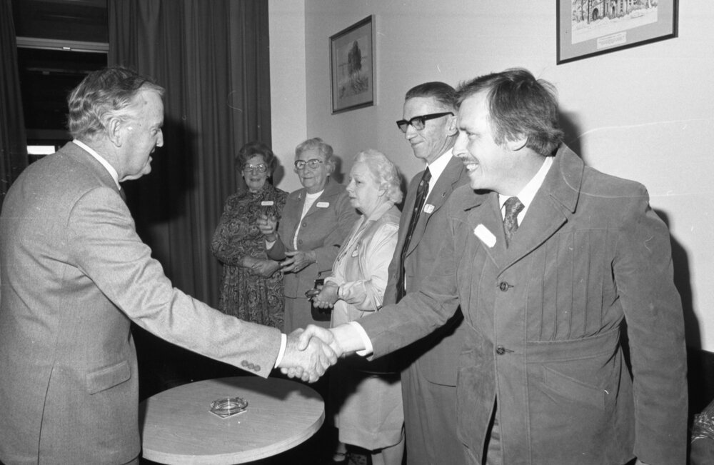 Premier Joh Bjelke-Petersen with unidentified Ipswich residents during a formal visit, Ipswich, August 1980