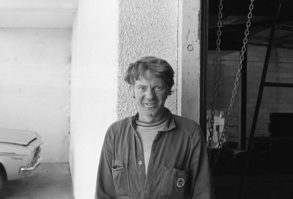 Employee at Jeff Denman's Tyre and Auto Service, Ipswich, August 1980