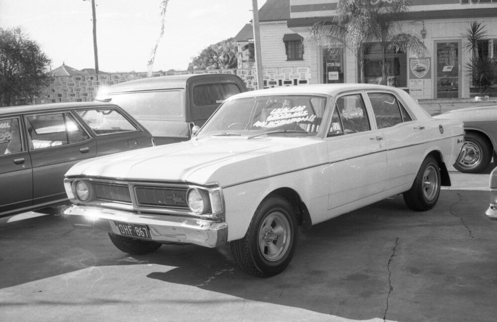 Ford Falcon sedan, car advertisement for Currie Motors, Ipswich, August 1980