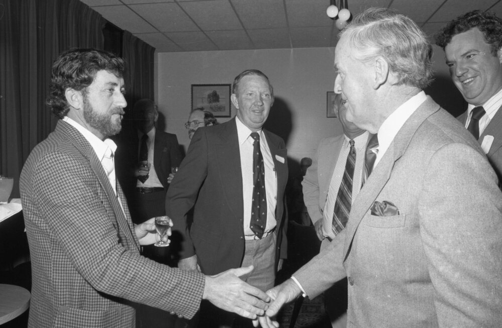 Premier Joh Bjelke-Petersen meeting with unidentified men during a formal visit, Ipswich, August 1980