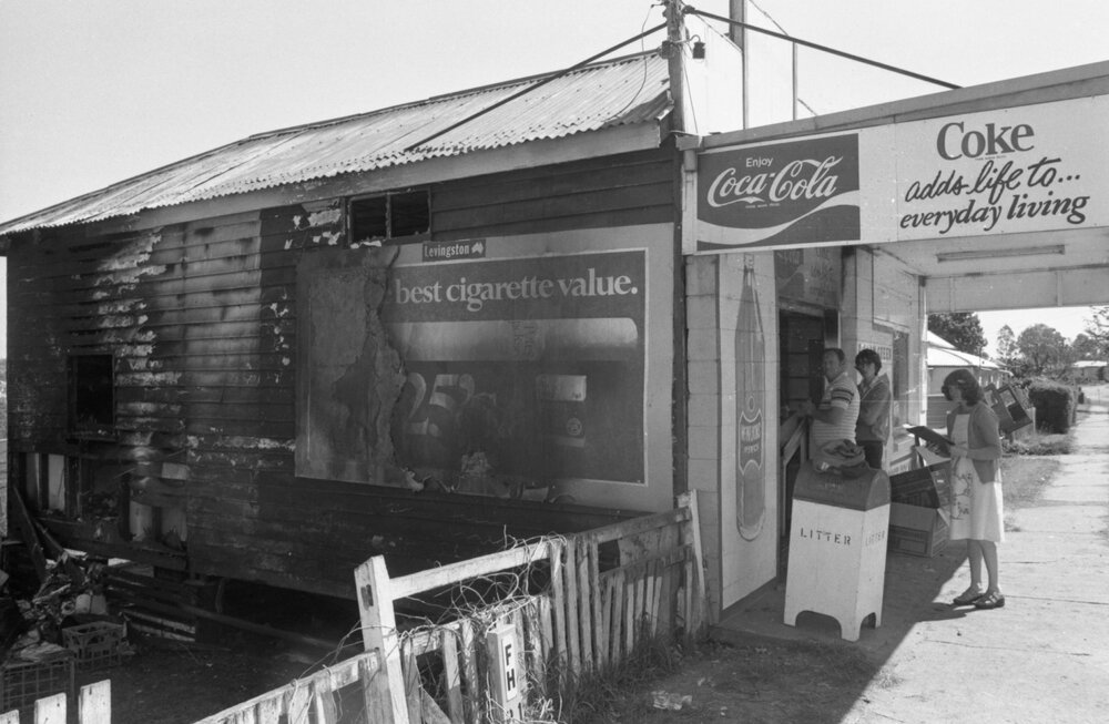 Fire damage to an unidentified convenience store, Ipswich, August 1980