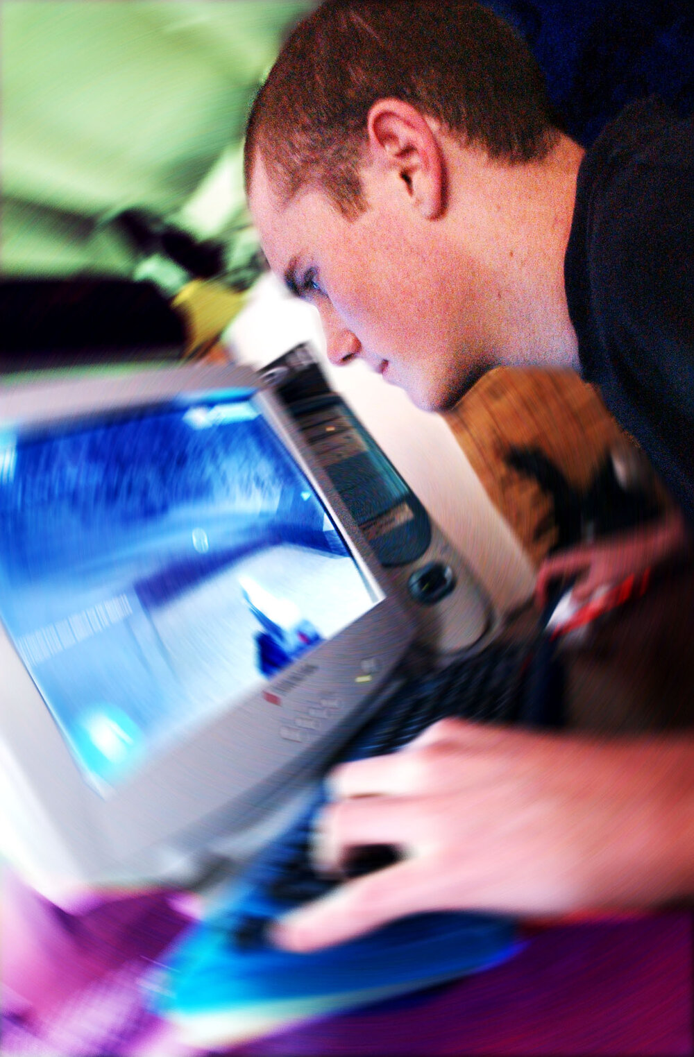 Kane Sawyer playing computer games, Ipswich, December 2003