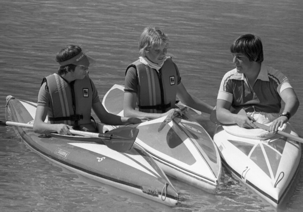 Three unidentified young men Kayak Racing, Ipswich, August 1980