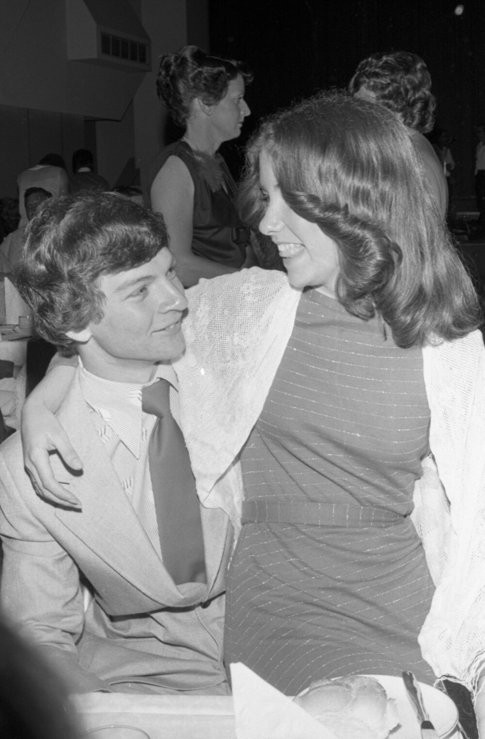Unidentified man and woman at dinner, Ipswich, August 1980