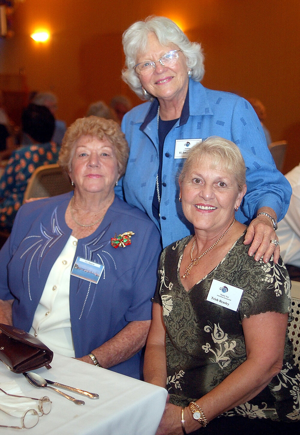 Vi Jorgensen from Barellon Point (top) , Pat Andrew from Locker Valey and Trish Beasley from Brassall at Christmas event, Ipswich, December 2003