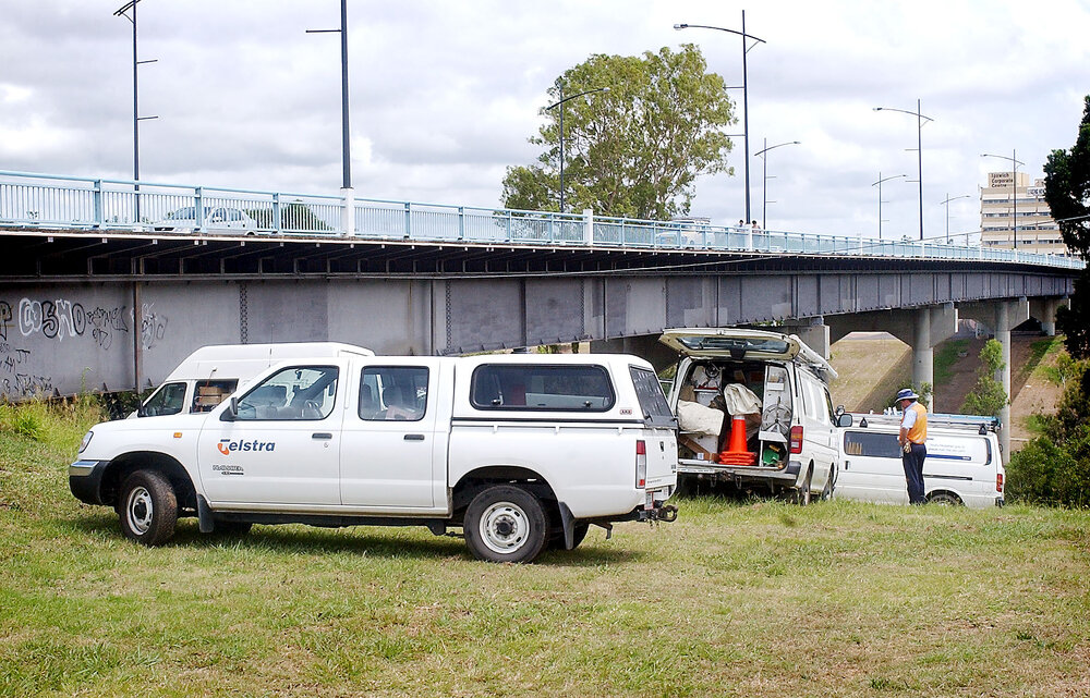Workers underneath north Ipswich's bridge, Ipswich, December 2003