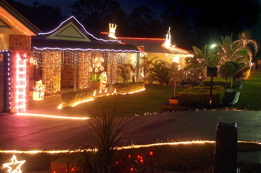 Houses lit up for Christmas at Collingwood Park, Ipswich, December 2003