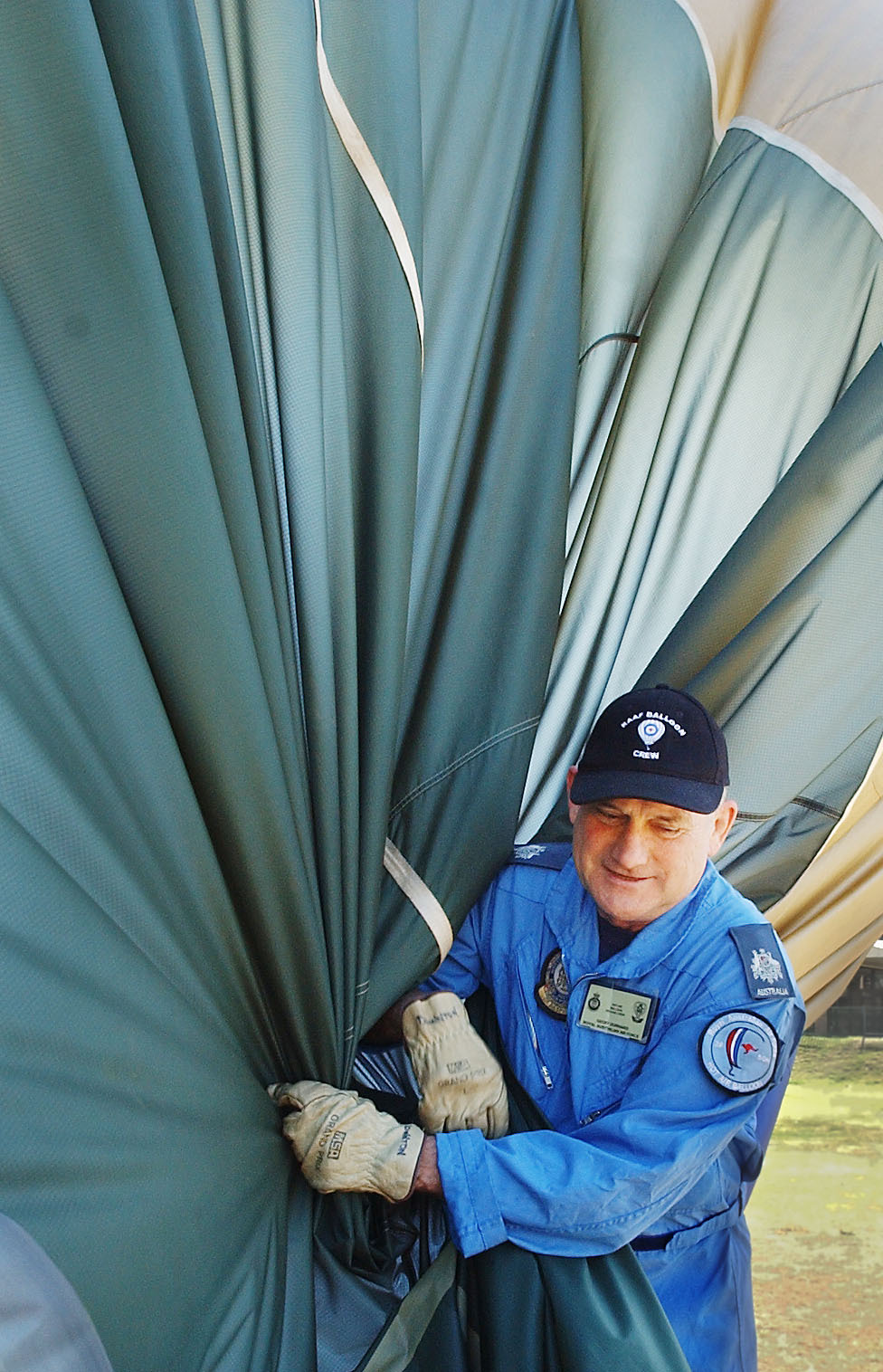 Royal Australian Air Force hot air balloon crew deflating hot air balloon, Ipswich, September 2003