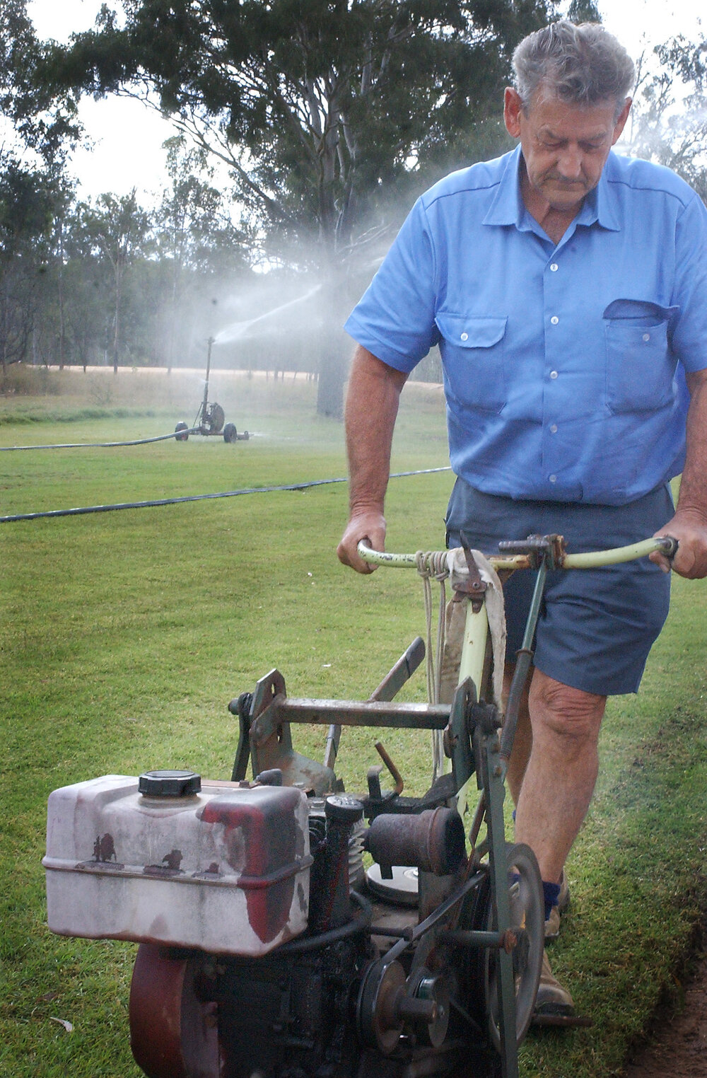 Rod Burnett tilling a field in Cloverdale Turf, Ipswich, September 2003