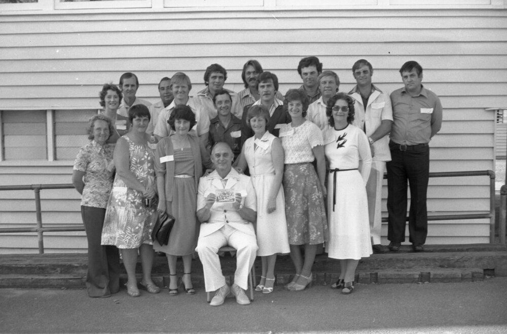 Group of past students recreating a school yeargroup picture, Ipswich, September 1980