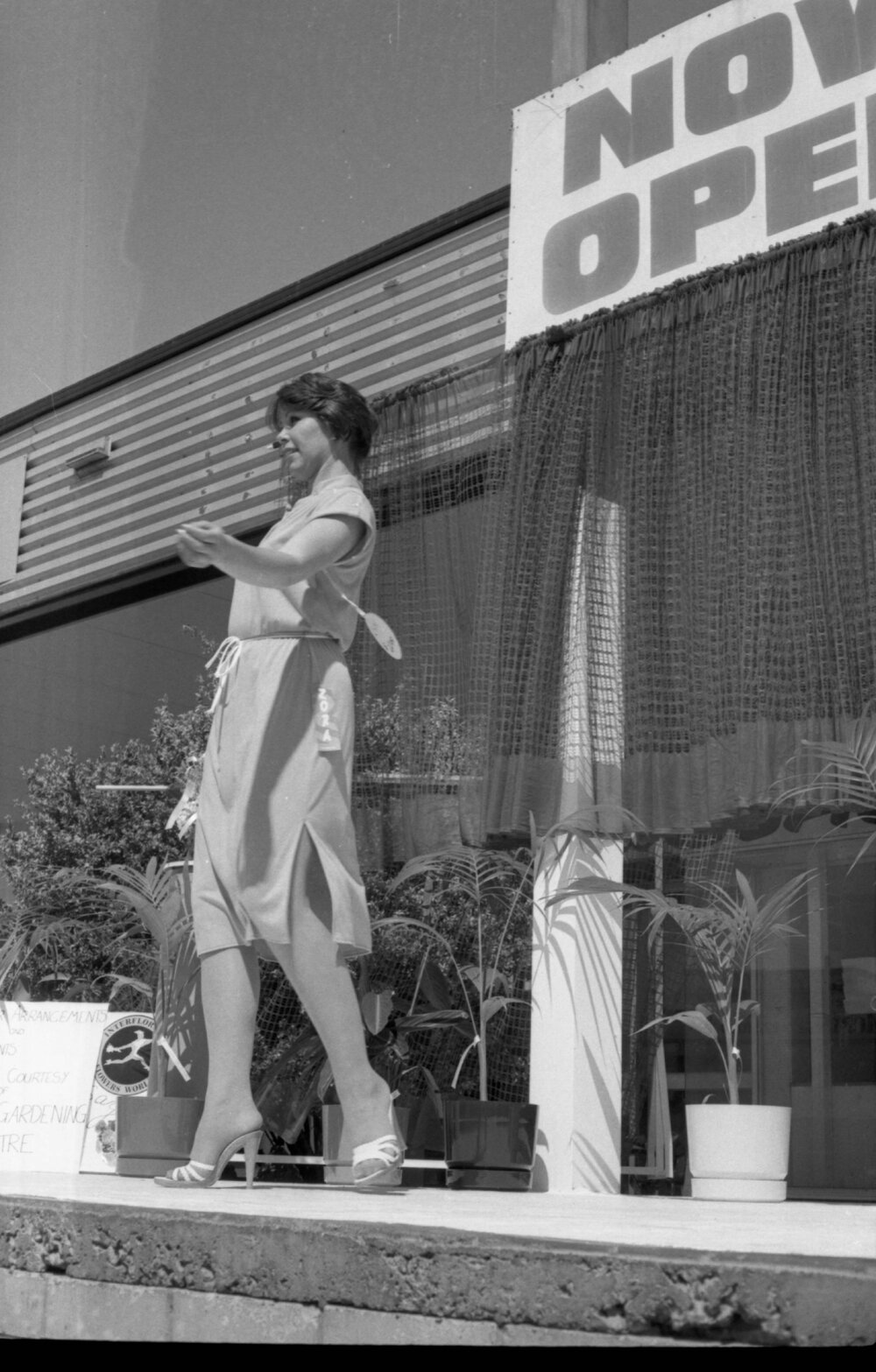 Unidentified model in a fashion parade at an unidentified shopping complex, Ipswich, September 1980