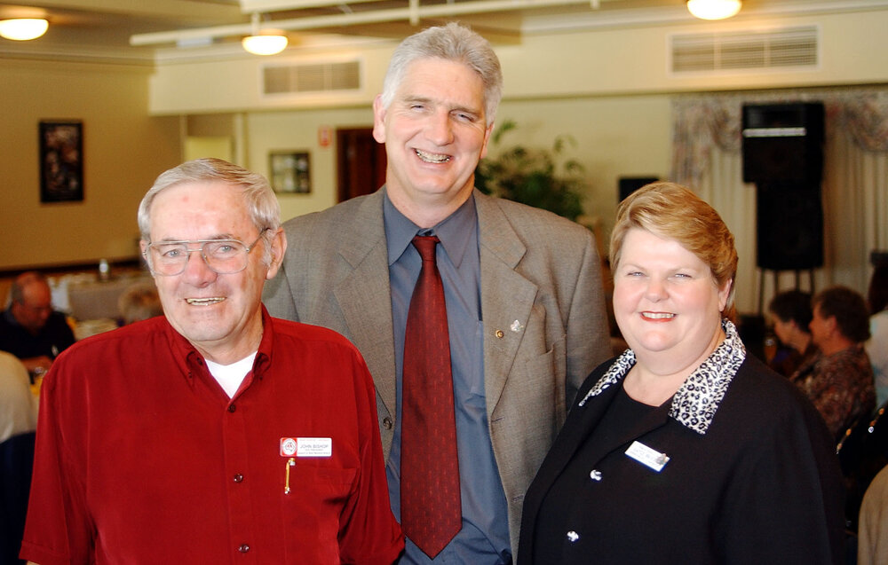 vice president John Bishop from Heart Support Australia, makes a donation to  Gerard Pender and Gayle Brockie for Ipswich Hospice, Ipswich, September 2003
