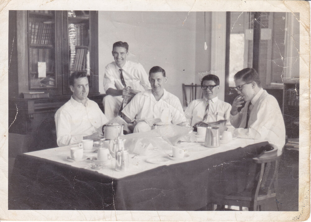 Doctors P. Strathfield, K Ivy, D. Hooper, Chong Wah, D. Yates in meeting room, Ipswich, 1950s