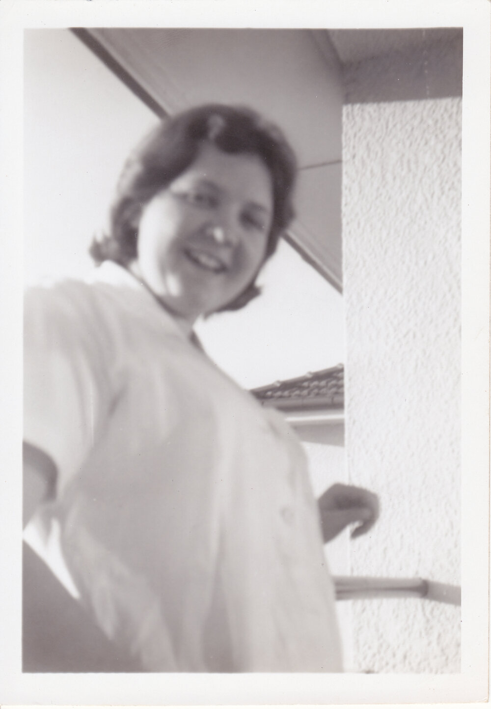 Nurse Barb Loxton on verandah Trumpy Home, Ipswich General Hospital, 1950s