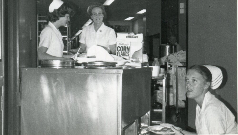 Meal Service, Enrolled Nurse Ruhl  Betty Ball. ?, with meal trolley, 1970s