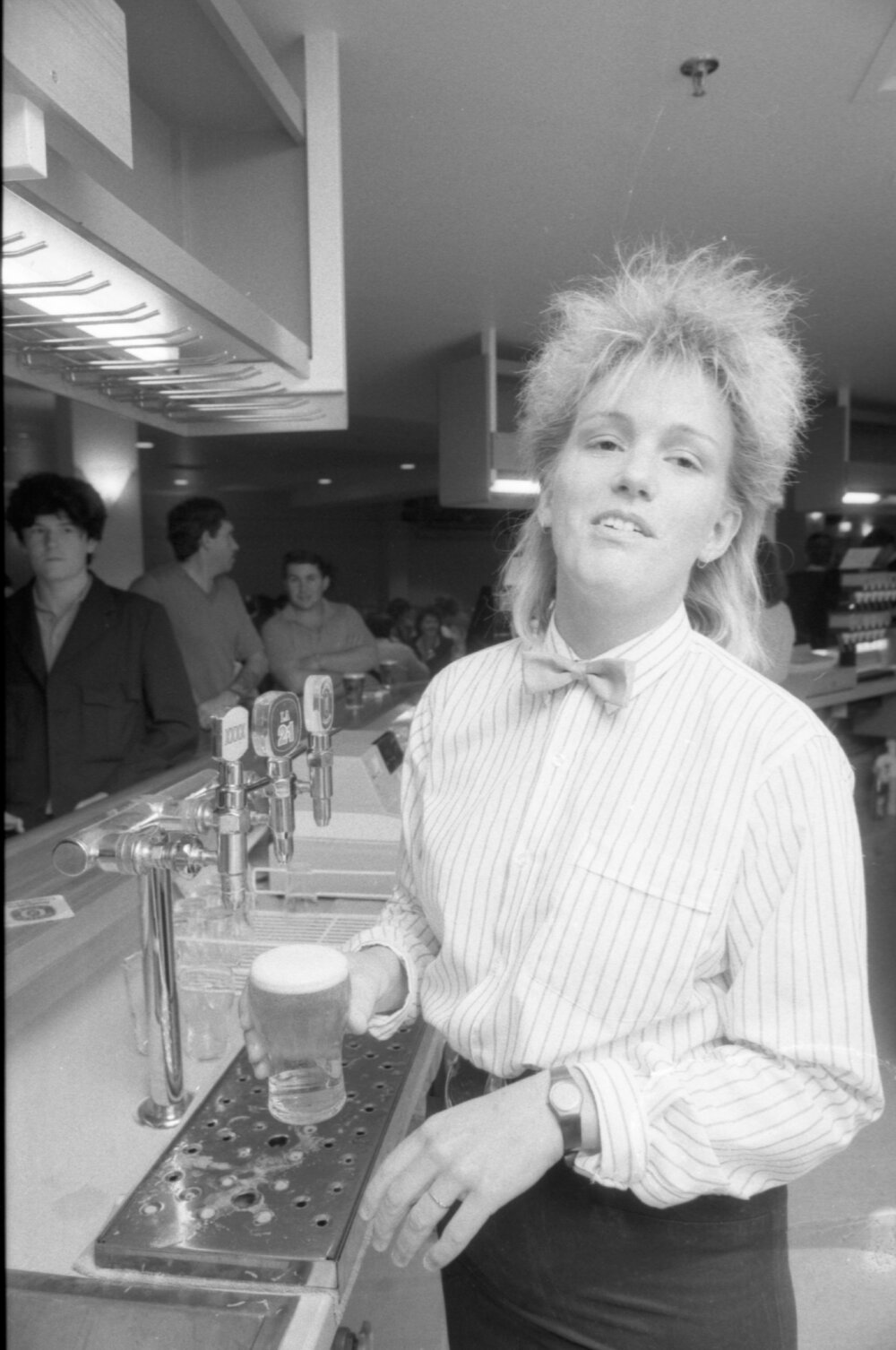 Bartender working at the opening of Ipswich City Square, Ipswich, August 1987 