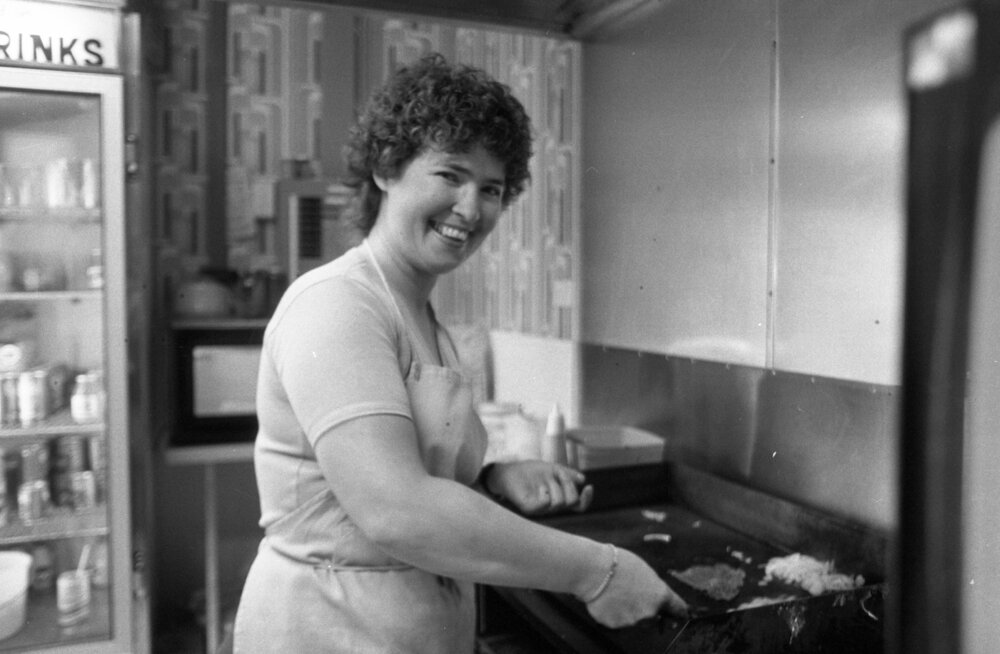 Denise Doyle cooking in a kitchen, Ipswich, September 1980