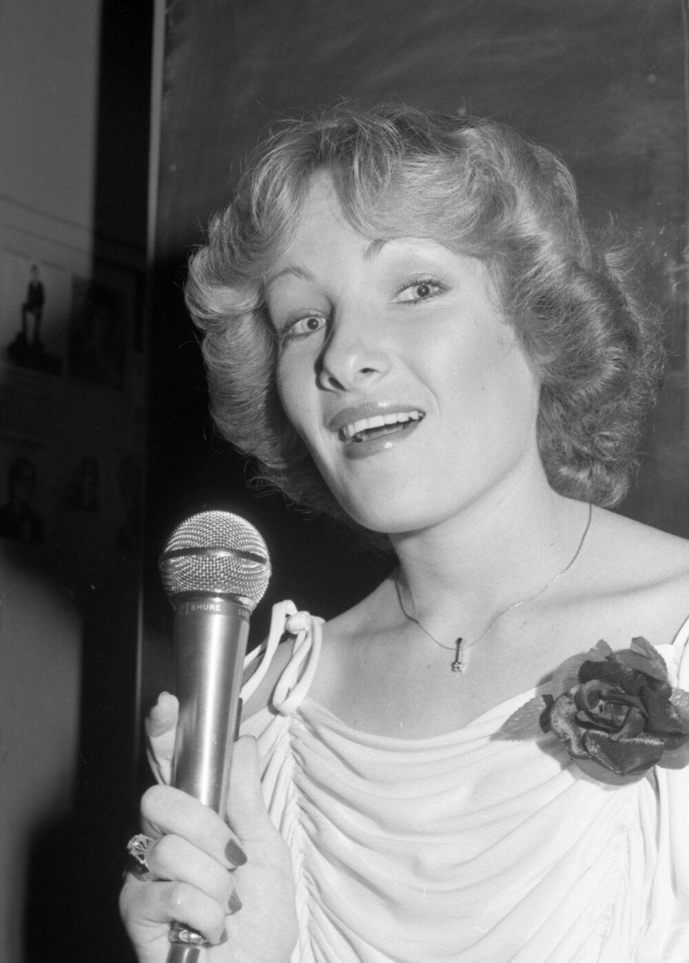 Unidentified woman performing with microphone for Dusty's Talent Quest, Ipswich, September 1980