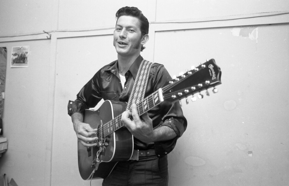 Unidentified man performing with a guitar for Dusty's Talent Quest, Ipswich, September 1980