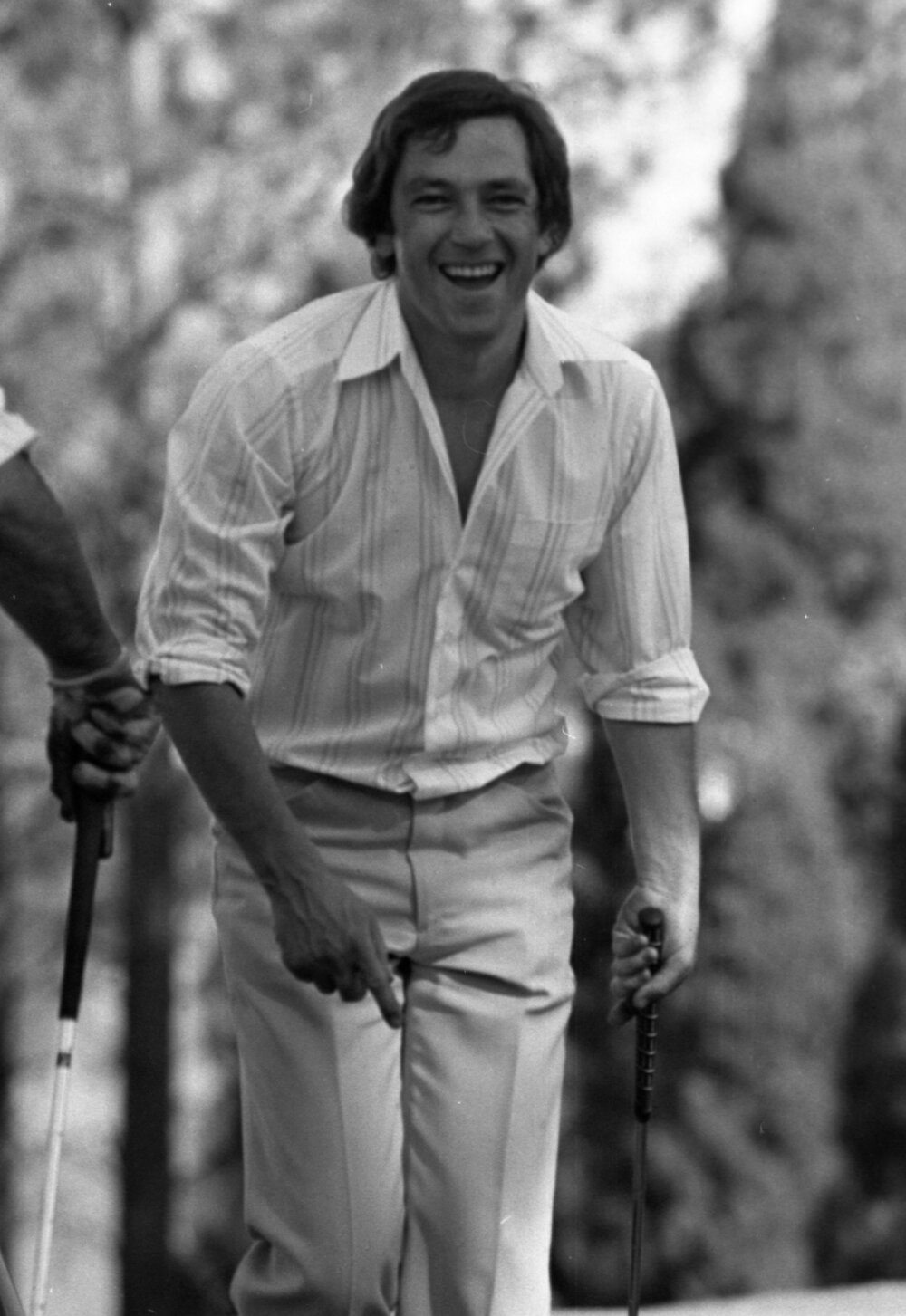 Unidentified golfer in bell-bottoms, Ipswich, September 1980