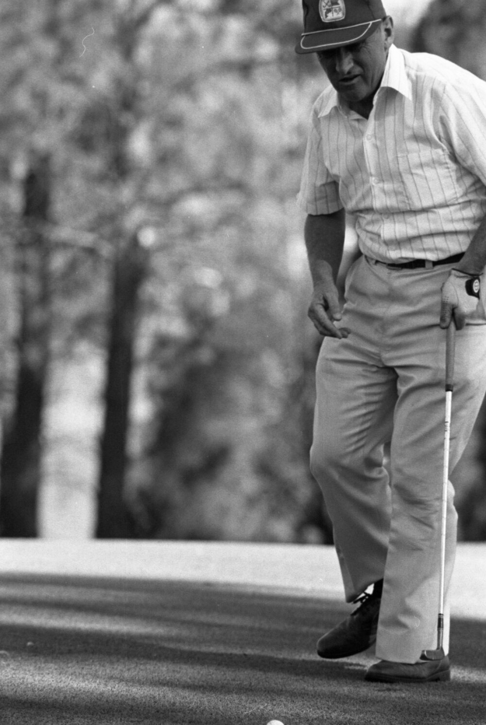 Unidentified golfer wearing cap with coat of arms, Ipswich, September 1980