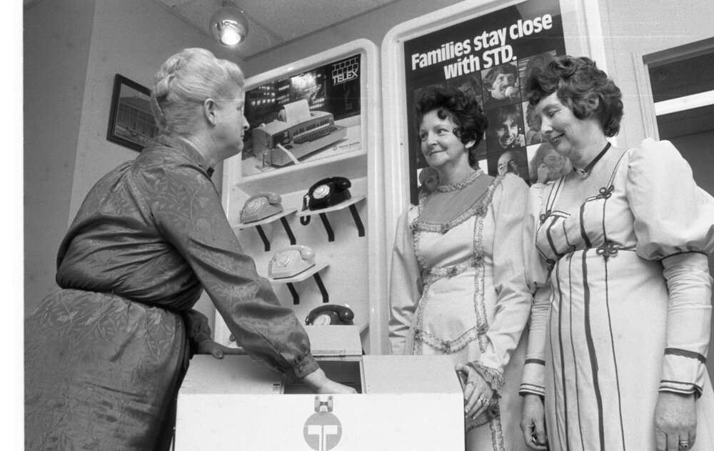 Margery Brier-Mills selecting a winner of a Telecom telecommunications raffle, Ipswich, September 1980