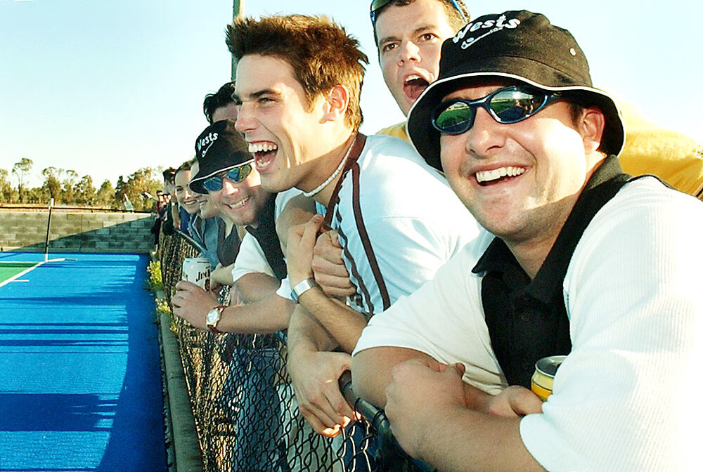Vocal Wests supporters spur on their team on tennis court, Ipswich, September 2003