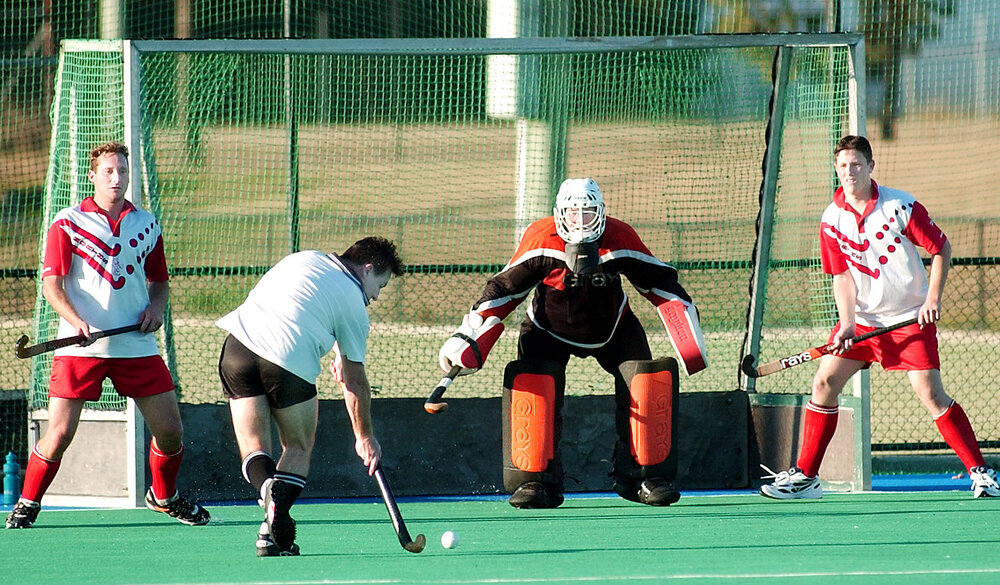 Unidentified players in a field hockey match, Ipswich, September 2003