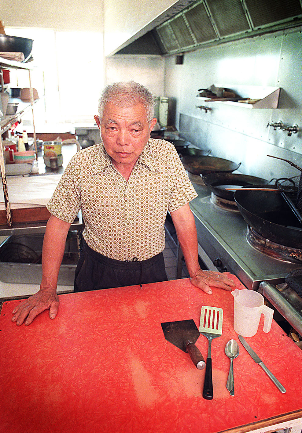 Jimmy Wah in his kitchen, Ipswich, June 2003