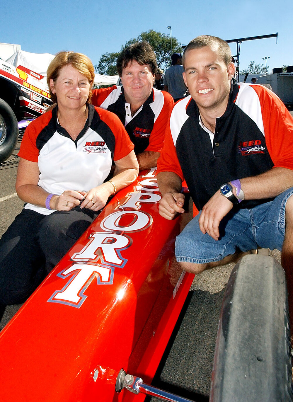 Debbie, Steven and Daniel Reed with racecar, Ipswich, June 2003
