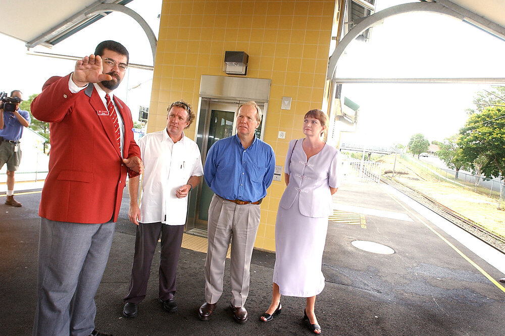 Premier Peter Beattie with unidentified people at Oxley railway station, Ipswich, February 2003