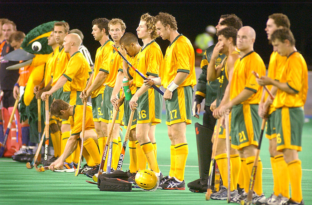 Thought to be the Kookaburras, the Australian Men's Hockey Team, preparing for their match against Netherlands, Briggs Road, Raceview, February 2003 